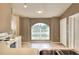Kitchen nook with an arched window offering plenty of natural light at 7968 Charleston Blvd, Lakeland, FL 33810