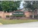 A welcoming 'Magnolia Manor' community sign surrounded by lush landscaping at 7968 Charleston Blvd, Lakeland, FL 33810