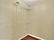 Empty walk-in closet with hanging rods and shelves ready for your belongings at 7968 Charleston Blvd, Lakeland, FL 33810