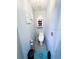 Bathroom with toilet, toilet paper holder, and cleaning supplies at 811 W Heron Pl, Winter Haven, FL 33884