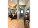 Dining room with decorative lighting, tile floors, and a modern table setting at 811 W Heron Pl, Winter Haven, FL 33884