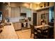 Updated kitchen featuring stainless steel appliances, granite countertops, and ample cabinet space at 811 W Heron Pl, Winter Haven, FL 33884