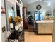 Open kitchen with granite countertops, modern appliances, and a view of the living area at 811 W Heron Pl, Winter Haven, FL 33884