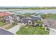 Aerial view of attractive single-Gathering home with well-manicured front lawn and landscaping at 1342 Heritage Landings Dr, Lakeland, FL 33805
