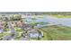 An aerial view of beautiful waterfront luxury homes overlooking a lake at 1342 Heritage Landings Dr, Lakeland, FL 33805