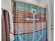 Bathroom featuring a decorative anchor shower curtain at 1342 Heritage Landings Dr, Lakeland, FL 33805