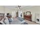 A spacious bedroom featuring carpeted floors, recessed lights and tray ceiling at 1342 Heritage Landings Dr, Lakeland, FL 33805
