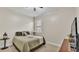 Simple bedroom with a bed, small window, and neutral color scheme at 1342 Heritage Landings Dr, Lakeland, FL 33805