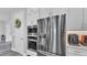 Modern kitchen featuring stainless steel appliances and white cabinetry with built in oven at 1342 Heritage Landings Dr, Lakeland, FL 33805