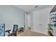Office space with shelving and a desk with monitors at 1342 Heritage Landings Dr, Lakeland, FL 33805