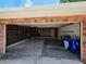 Spacious garage with an open door, providing ample parking and storage at 1528 Hallam S Ct, Lakeland, FL 33813