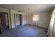 Spacious main bedroom with carpet flooring and a closet at 1528 Hallam S Ct, Lakeland, FL 33813