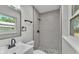 Modern bathroom featuring a tiled shower and contemporary fixtures at 1650 W Mcleod St, Bartow, FL 33830
