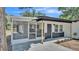 Charming single-story home featuring a screened porch and freshly painted exterior accents at 1650 W Mcleod St, Bartow, FL 33830