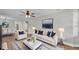 Bright living room features modern decor and plenty of seating for entertaining and relaxation at 1650 W Mcleod St, Bartow, FL 33830