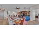 Comfortable living room featuring neutral paint, and stylish furniture, and convenient access to the pantry at 1983 Via Lago Dr, Lakeland, FL 33810