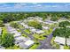 Community aerial view showcasing lush surroundings and a peaceful residential area at 635 Cottage Ln # 635, Lakeland, FL 33803
