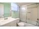 Cozy bathroom with a shower and tub combination and an elegant glass door at 635 Cottage Ln # 635, Lakeland, FL 33803
