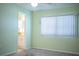 Cozy bedroom with a bright window and soft carpet, creating a serene retreat at 635 Cottage Ln # 635, Lakeland, FL 33803