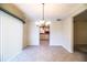 Well-lit dining area with tile flooring adjoins the kitchen space at 635 Cottage Ln # 635, Lakeland, FL 33803