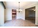 The tile-floored dining room connects to the kitchen and living room for open-concept living at 635 Cottage Ln # 635, Lakeland, FL 33803