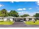 Charming home with convenient carport and well-kept lawn and landscaping at 635 Cottage Ln # 635, Lakeland, FL 33803