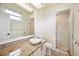 Bathroom featuring a granite countertop, modern sink, and a glass-enclosed shower at 715 Hanover Ct, Lakeland, FL 33813