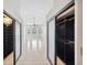 Walk-in closet featuring sliding doors and custom shelving at 715 Hanover Ct, Lakeland, FL 33813