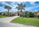 Attractive single-story home featuring a brick driveway and mature landscaping, offering a welcoming and well-maintained appearance at 715 Hanover Ct, Lakeland, FL 33813