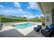 Relaxing backyard pool and spa area with patio seating, perfect for outdoor entertaining and leisure at 715 Hanover Ct, Lakeland, FL 33813