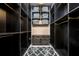 Spacious walk-in closet with built-in shelving, drawers, and a decorative rug at 715 Hanover Ct, Lakeland, FL 33813