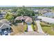 An attractive aerial view of the house showing the neatly landscaped yard and nearby businesses at 7230 Hileman W Dr, Lakeland, FL 33810