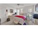 Well-lit bedroom with a cozy bed, dresser, and decor, creating a comfortable space at 7230 Hileman W Dr, Lakeland, FL 33810