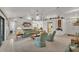 Spacious living room with an open floor plan, vaulted ceilings, and lots of natural light at 7230 Hileman W Dr, Lakeland, FL 33810