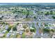 An aerial shot of a residential neighborhood in close proximity to a golf course at 1010 Penguin Pl, Lakeland, FL 33809