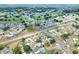 An aerial view of a well-maintained neighborhood that is close to the local golf course at 1010 Penguin Pl, Lakeland, FL 33809