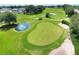 Aerial view of the expertly manicured golf course at Sandpiper Golf and Country Club at 1010 Penguin Pl, Lakeland, FL 33809