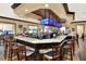 A bar and restaurant with a marble countertop, and multiple tv screens for entertainment at 1010 Penguin Pl, Lakeland, FL 33809