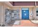 Community showers with stone walls and flooring, and metal grab bars at 1010 Penguin Pl, Lakeland, FL 33809