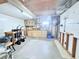 Features storage cabinets, pegboard walls for organizing, and a large work area at 1011 Pine Ridge Dr, Lakeland, FL 33809