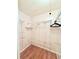 Walk-in closet with vinyl floors, ventilated shelving, and plenty of storage space at 1011 Pine Ridge Dr, Lakeland, FL 33809