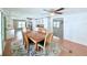 Open concept dining room with view to kitchen at 1011 Pine Ridge Dr, Lakeland, FL 33809