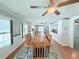 Large dining area offers bright light and ceiling fan at 1011 Pine Ridge Dr, Lakeland, FL 33809