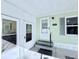 Welcoming entryway featuring a storm door and side door for convenience and added light at 1011 Pine Ridge Dr, Lakeland, FL 33809
