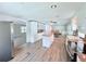Open concept kitchen with stainless appliances and breakfast bar at 1011 Pine Ridge Dr, Lakeland, FL 33809