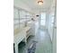 Laundry Room with included appliances, shelving, and storage at 1011 Pine Ridge Dr, Lakeland, FL 33809