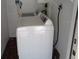 Laundry room featuring a white washing machine ready for use at 1014 Lexington St, Lakeland, FL 33801
