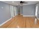 Open-concept living area with hardwood floors, and neutral color palette at 1014 Lexington St, Lakeland, FL 33801