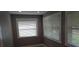 A well-lit room featuring two windows with white blinds at 1014 Lexington St, Lakeland, FL 33801