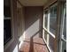 Relaxing sunroom with decorative tile floors and plenty of natural light at 1014 Lexington St, Lakeland, FL 33801